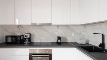 Departamento de lujo | Cocina privada | Refrigerador con congelador, microondas, horno y parrilla de estufa