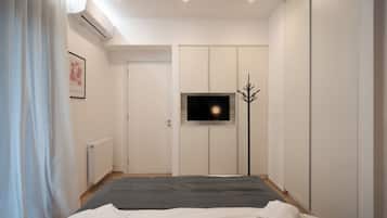 Apartamento superluxo | Roupas de cama premium, cofres nos quartos, individualmente decorados