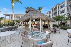 Outdoor dining - Beautiful, Stylish Poolside Condo! (Bonita Springs)