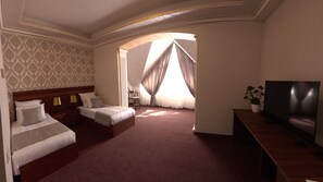 Deluxe Twin Room, City View | In-room safe, desk, soundproofing, iron/ironing board