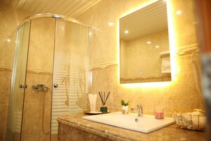 Hair dryer, slippers, towels, soap