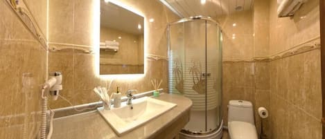 Hair dryer, slippers, towels, soap