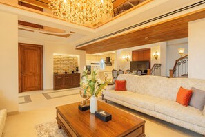 55-inch LED TV with digital channels - ELIVAAS privé The Royce Orchid 4BHK (Kasauli)