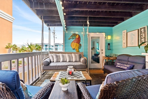 Coastal Condo Steps From the Beach