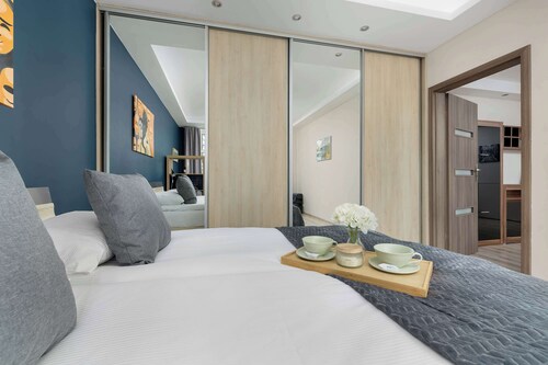 Cozy Apartment in Katowice | Balcony and Workspace