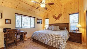 A bedroom with a bed, desk, chair, and a ceiling fan. - Escape to Alpine! Outstanding Cabin w/ Deck & Yard (Alpine)