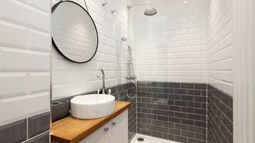 Shower, hair dryer, towels, shampoo