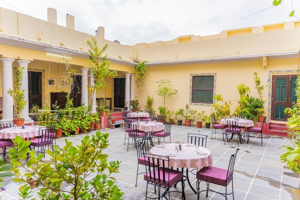Standard Quadruple Room, Courtyard View | Outdoor dining