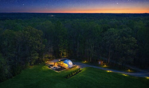 One of kind wellness/glamping experience with wellness amenities, covered outdoor dining, a complete live fire cooking setup, and a clear star gazing top.