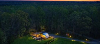 One of kind wellness/glamping experience with wellness amenities, covered outdoor dining, a complete live fire cooking setup, and a clear star gazing top.
