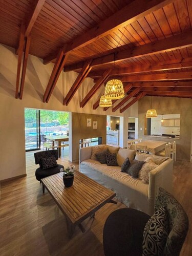 HOUSE LAS MAGNOLIAS IN VILLA GRAL BELGRANO FOR 8 PEOPLE WITH PARK AND SWIMMING POOL