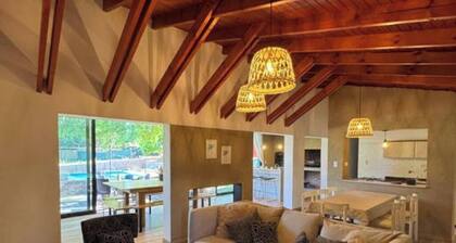 HOUSE LAS MAGNOLIAS IN VILLA GRAL BELGRANO FOR 8 PEOPLE WITH PARK AND SWIMMING POOL