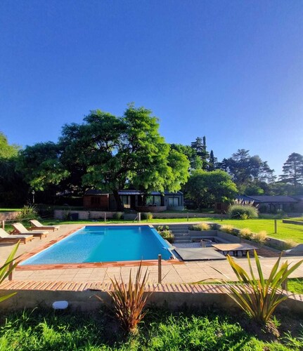 HOUSE LAS MAGNOLIAS IN VILLA GRAL BELGRANO FOR 8 PEOPLE WITH PARK AND SWIMMING POOL