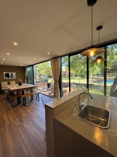 HOUSE LAS MAGNOLIAS IN VILLA GRAL BELGRANO FOR 8 PEOPLE WITH PARK AND SWIMMING POOL