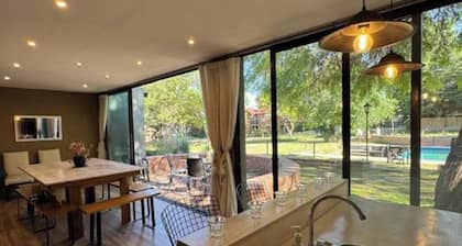 HOUSE LAS MAGNOLIAS IN VILLA GRAL BELGRANO FOR 8 PEOPLE WITH PARK AND SWIMMING POOL