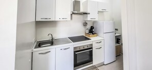 Condo, balcón | Cocina privada