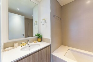 Exclusive Apartment, Non Smoking, Park View | Bathroom | Combined shower/tub, hair dryer, slippers, towels