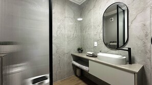 Hair dryer, towels, soap, toilet paper - Modern Oceanview Escape (Cape Town)