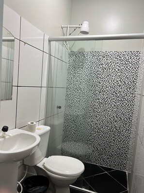 Shower, towels, soap, toilet paper