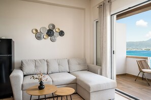 Apartment, 2 Bedrooms, Terrace, Sea View | Living area | 32-inch TV with digital channels - Apovrado Stay by Konnect, Kommeno (Corfu)