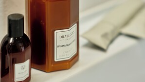 Two bottles of Dr. Vranes hand and body lotion on a white surface. - Rishon (Rome)
