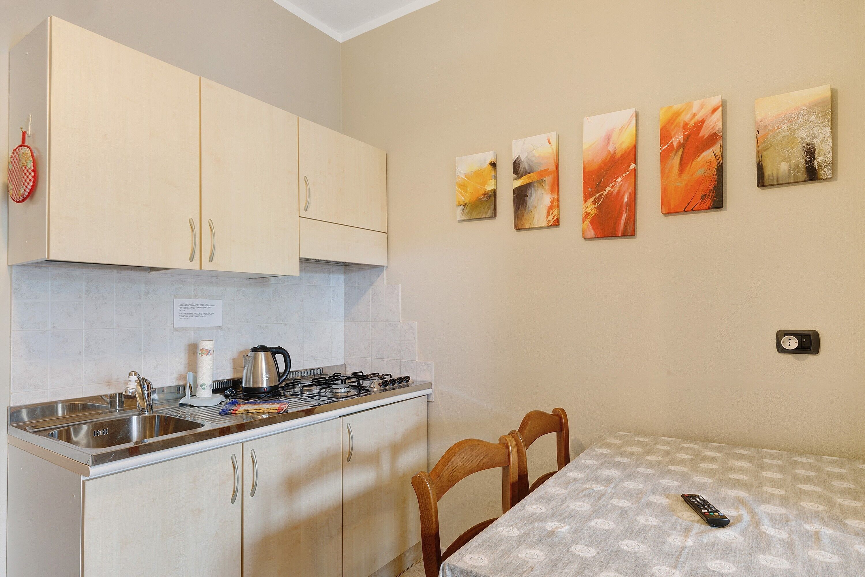 Fridge, stovetop, coffee/tea maker, electric kettle