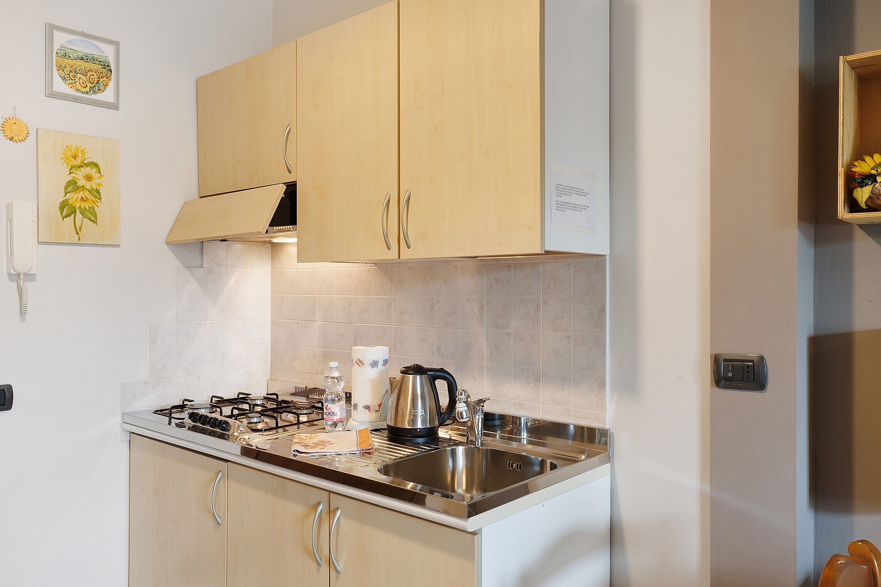 Fridge, stovetop, coffee/tea maker, electric kettle