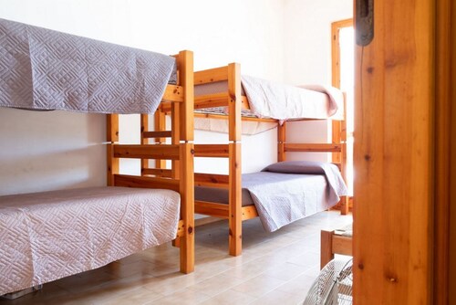 A comfortable 65 square meters apartment, perfect for six people, located on the first floor of a building without an elevator within a residential complex.The property is located in Alghero and enjoys an excellent location, close to the sea and several 