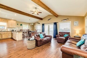 Living area - This island canal home near San Luis Pass provides beautiful views and sunsets! (Freeport)