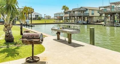 This island canal home near San Luis Pass provides beautiful views and sunsets!