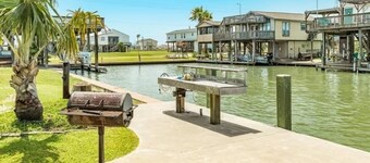 This island canal home near San Luis Pass provides beautiful views and sunsets!