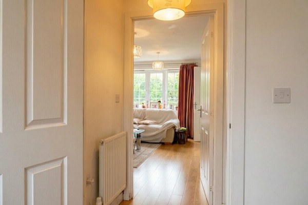 Warm hallway draws you straight into the bright and welcoming living space.