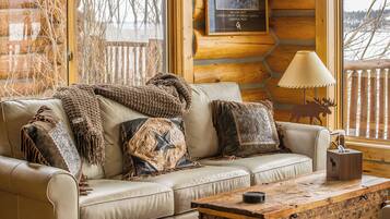 Deluxe Cabin, Lake View | Living area