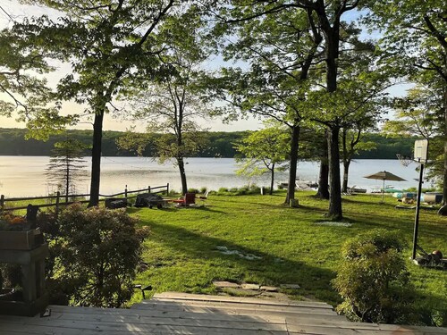 Spring fed Lake front home floating dock and boats