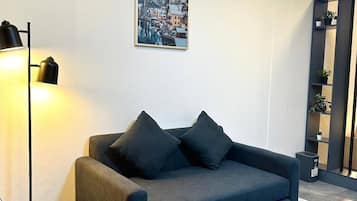 Apartamento, 1 quarto, para fumantes | Área de estar
