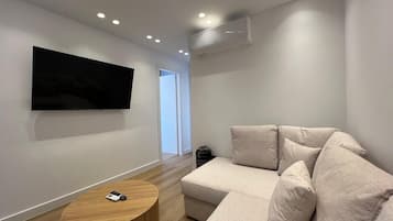 Family Apartment, Patio | Living area