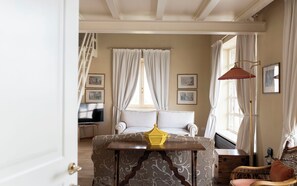 Suíte, vista para o jardim | Área de estar