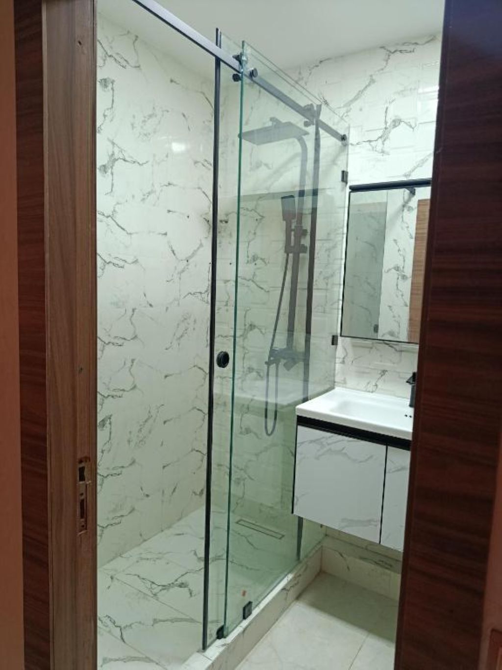 Shower, towels, soap, toilet paper