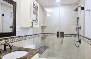 Shower, hair dryer, towels, soap
