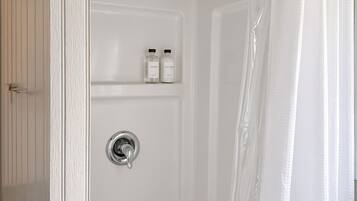 Shower, free toiletries, towels, soap