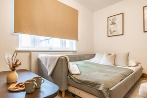 1 dormitorio, tabla de planchar con plancha, cuna de viaje y wifi