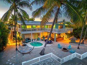 Exterior - Green Turtle Oasis: 4BR Canal Front Home, Pool, Dockage, Outdoor Dining & Pets (Sugarloaf Key)