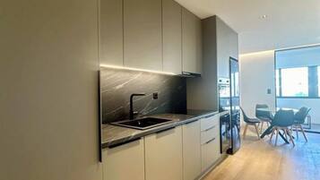 Family Apartment | Private kitchen | Fridge, oven, stovetop, cookware/dishes/utensils