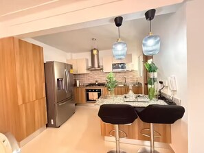 Private kitchen - Modern penthouse with Jacuzzi near the airport (Santiago de los Caballeros)