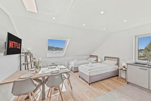 15-minute walk | Scenic views · Modern & quiet