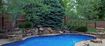 Gorgeous 5-bedroom house: private outdoor space with a pool and outdoor kitchen.