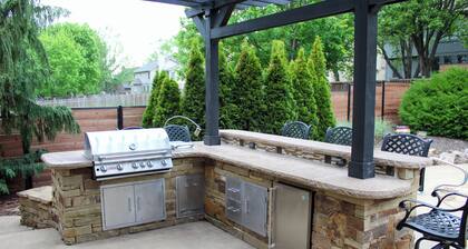 Gorgeous 5-bedroom house: private outdoor space with a pool and outdoor kitchen.