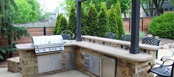 Gorgeous 5-bedroom house: private outdoor space with a pool and outdoor kitchen.