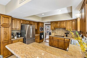Fridge, microwave, oven, stovetop - The Haven on Twisted Wood • 4BR | 3BA • Sleeps 12 (San Antonio)
