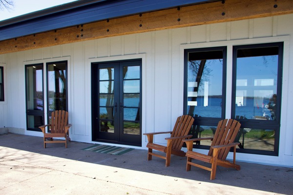 You can see the reflection of the lake in the windows.